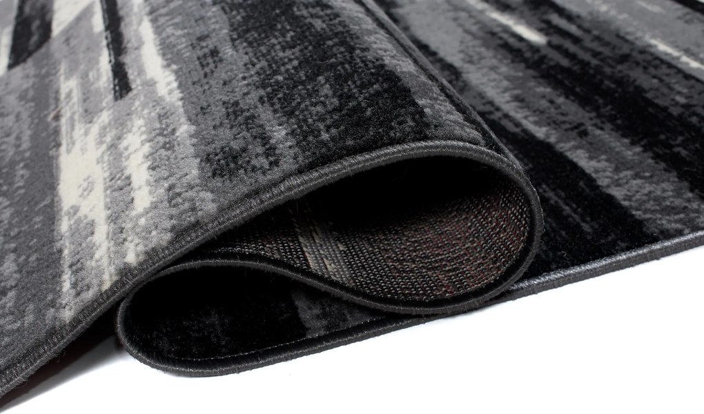 TA Koberec F809A TMAVO SIVÁ LACNÁ PP CRM Rozmer: 80x200 cm