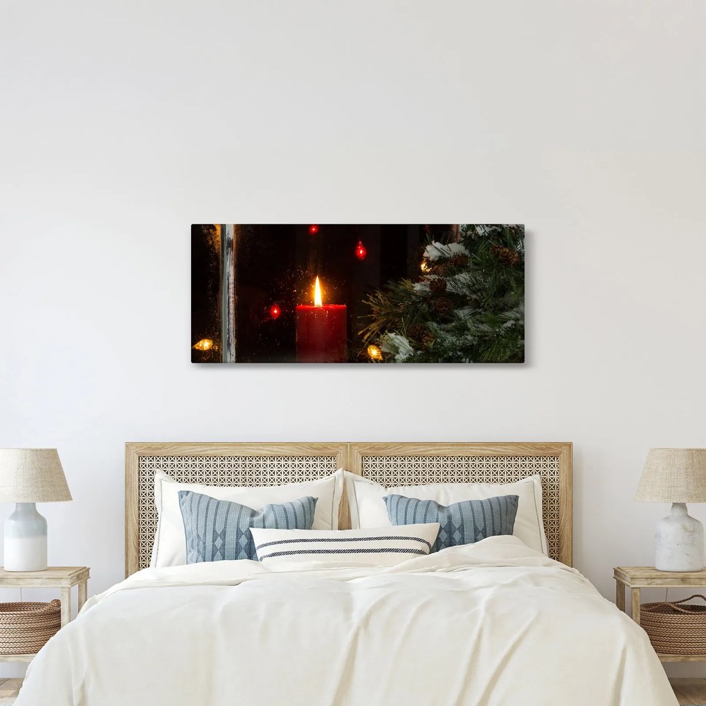 Obraz - Žiariaca vianočná sviečka (120x50 cm)