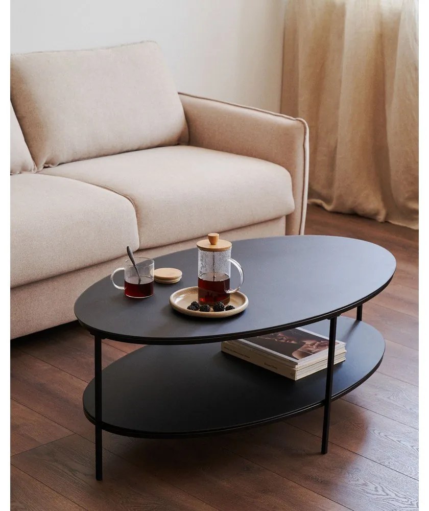 Čierny konferenčný stolík so sklenenou doskou 65x110 cm Fideia – Kave Home
