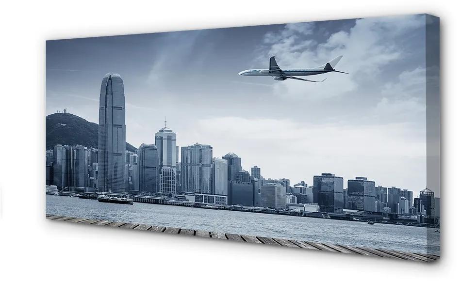 Obraz canvas Lietadiel mraky město 125x50 cm