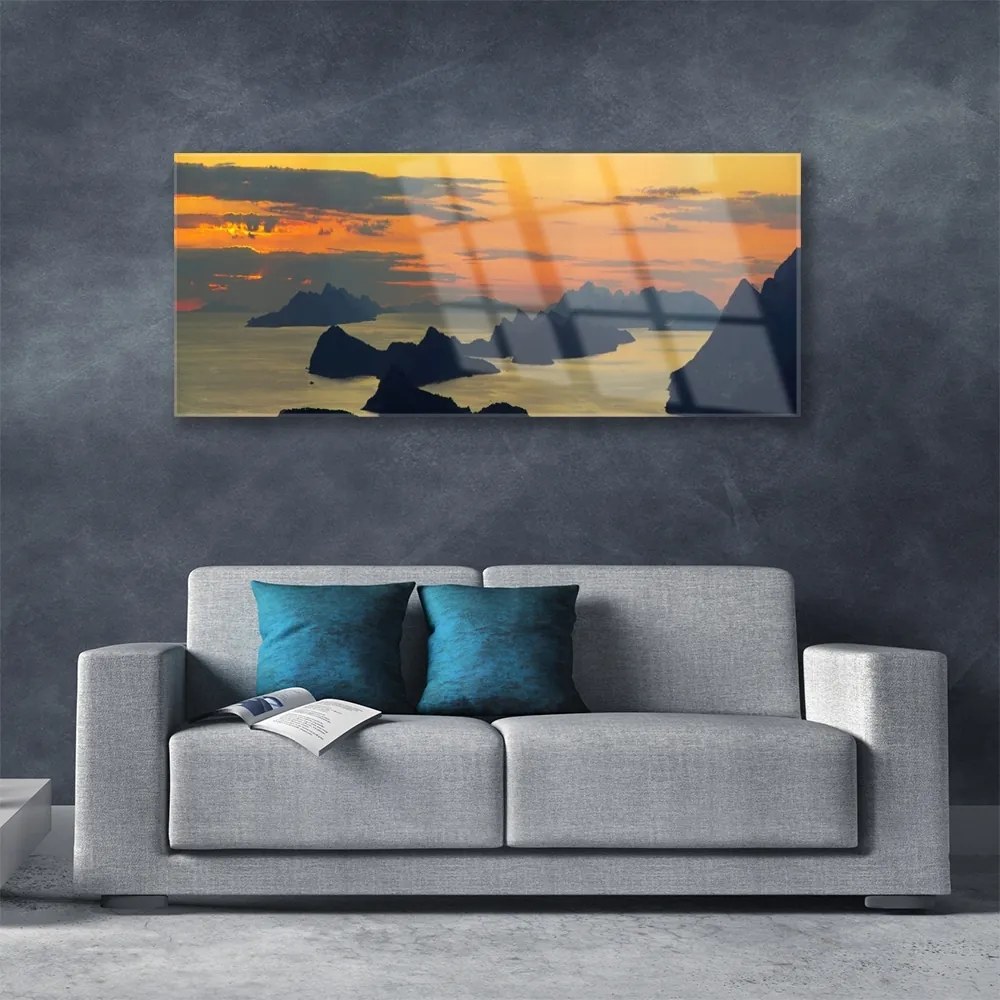 Obraz plexi More skaly hory príroda 125x50 cm