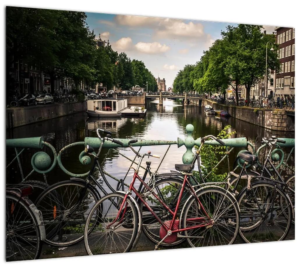 Sklenený obraz bicykla v meste (70x50 cm)