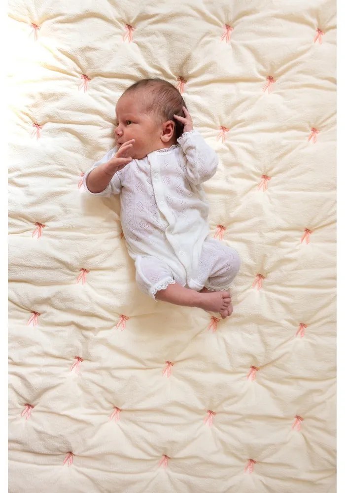 Svetložltá/ružová prešívaná detská deka z Bio bavlny 90x120 cm Bows – Cam Cam Copenhagen