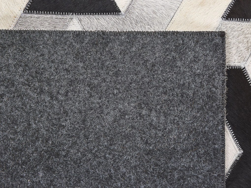 Kožený koberec 160 x 230 cm sivá/čierna NARMAN Beliani