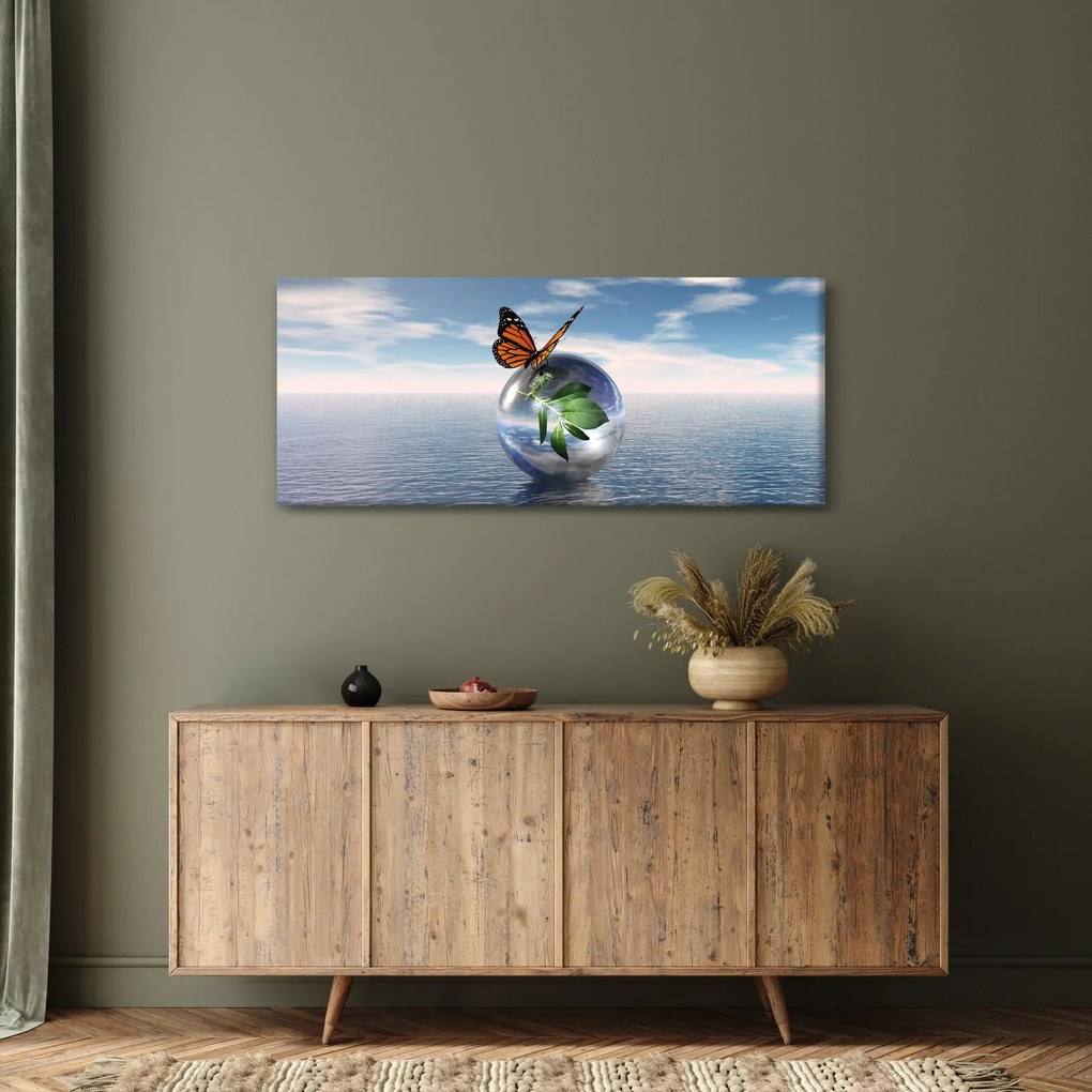 Obraz motýľa na sklenenej guli (120x50 cm)