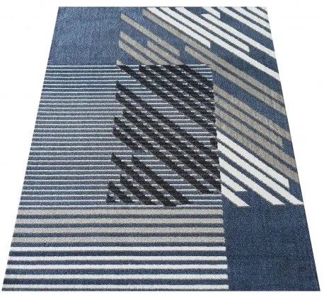 Dizajnový koberec modrej farby s pruhmi Šírka: 60 cm | Dĺžka: 100 cm
