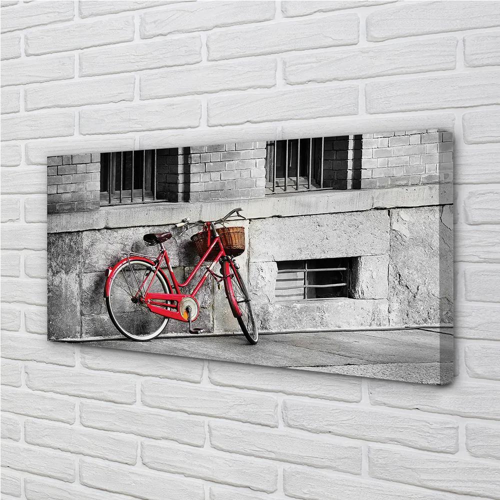 Obraz canvas Červené koleso s košíkom 100x50 cm