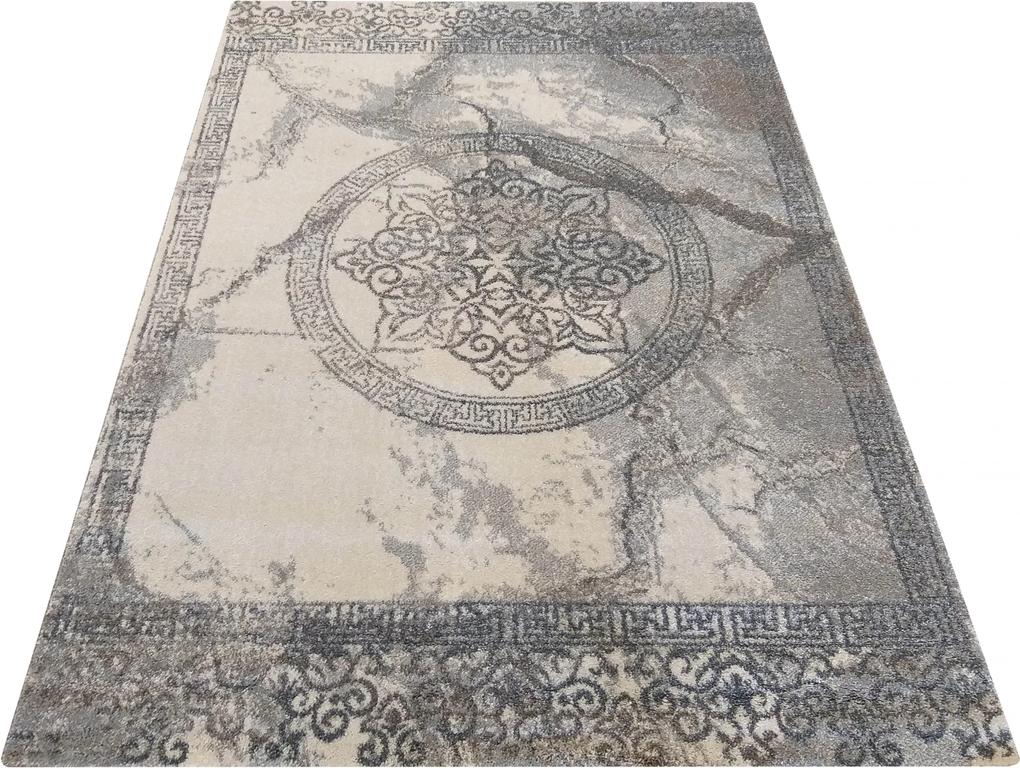 Sivý koberec so vzorom mandaly