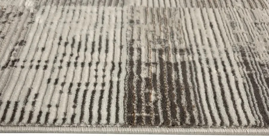 DC Koberec Oman 637 tmavá vizion zlatá Rozmer: 120×170 cm