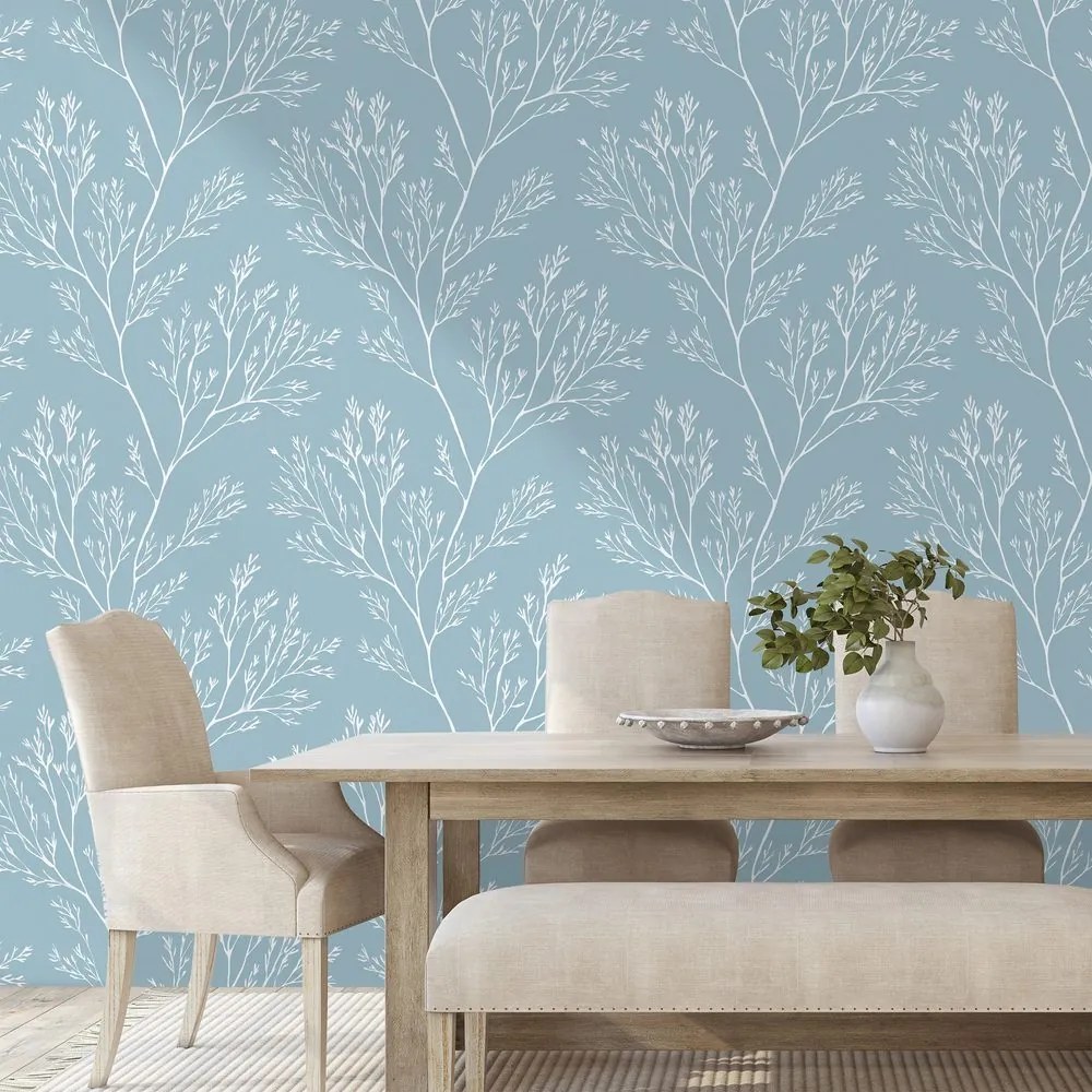 Fototapeta biele vetvičky na modrom pozadí