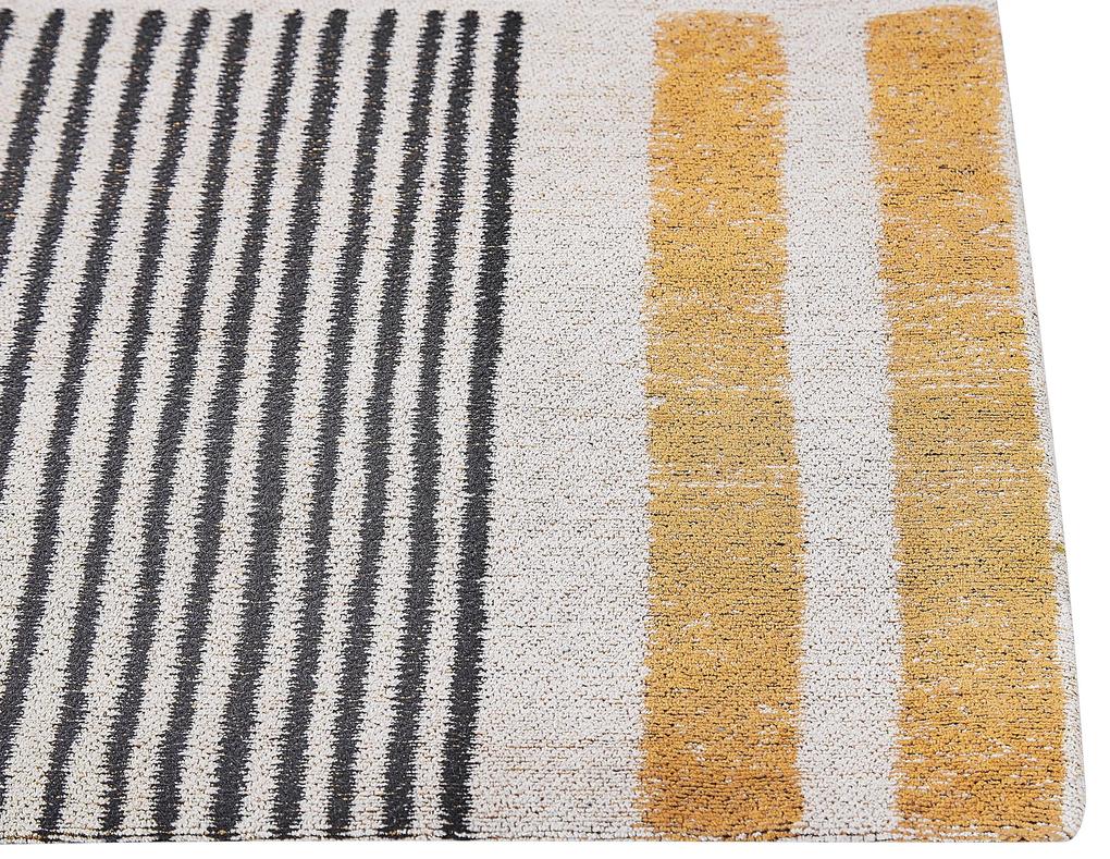 Bavlnený koberec 140 x 200 cm žltá/čierna KATRA Beliani