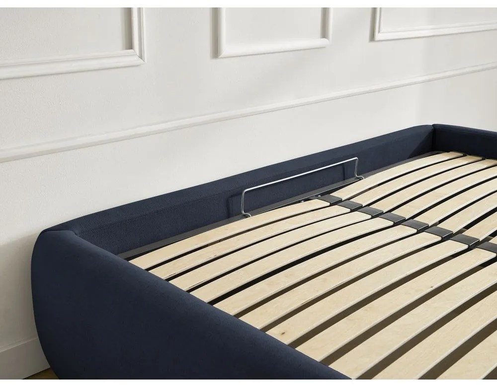 Tmavomodrá čalúnená dvojlôžková posteľ s úložným priestorom/bez čela s roštom 160x200 cm Inera – Bobochic Paris