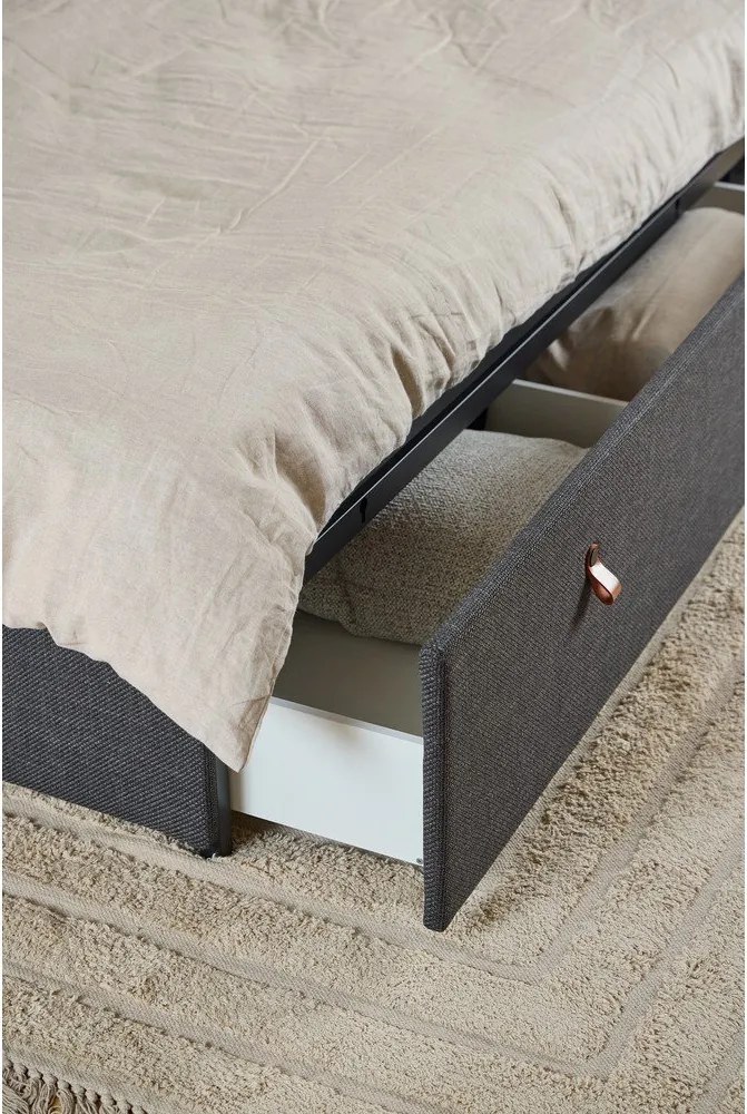 Tmavosivá čalúnená dvojlôžková posteľ s úložným priestorom s roštom 160x200 cm Calvi – Actona