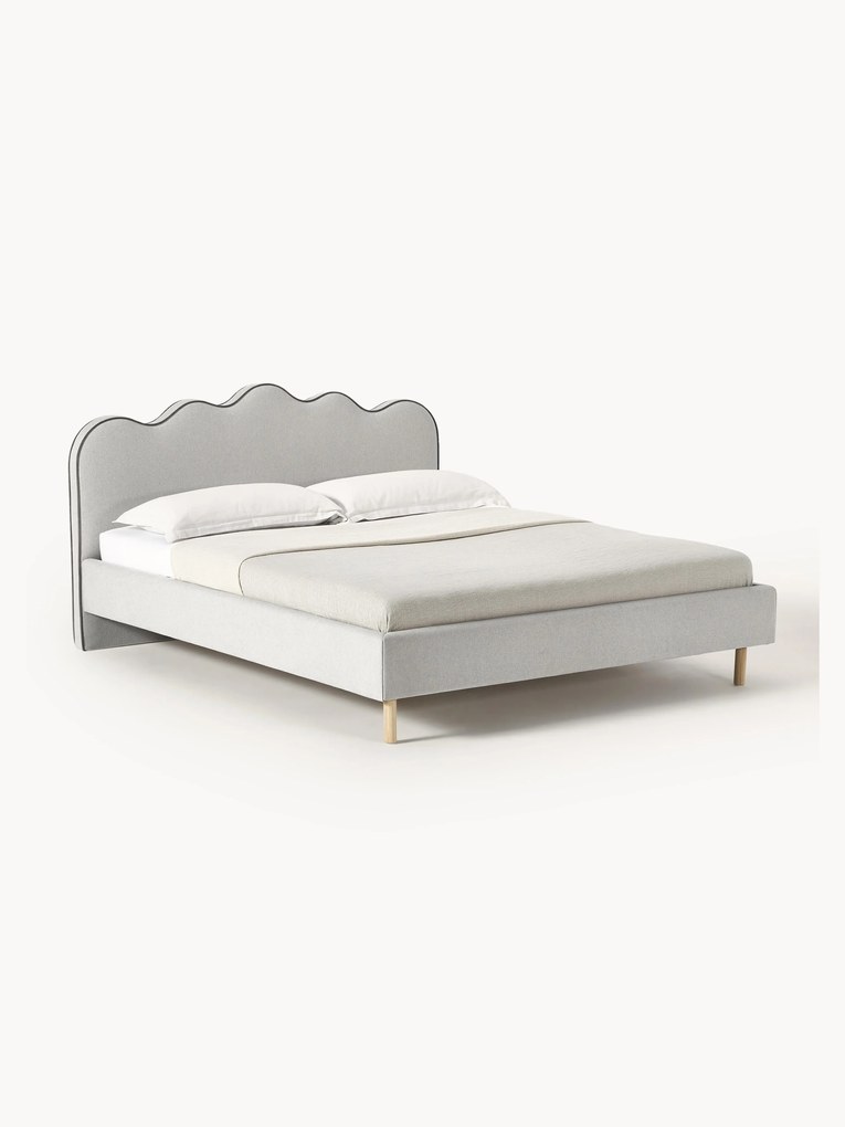 Čalúnená posteľ s vlnovým záhlavím Romy