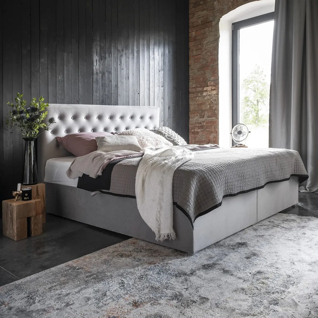Čalúnená manželská posteľ s úložným priestorom Liborn 140 - tmavomodrá