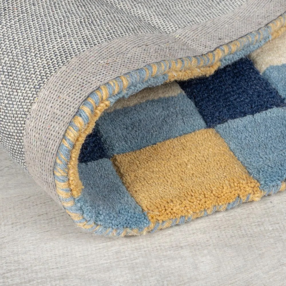 Modrý ručne tkaný vlnený koberec 160x230 cm Kai Wool Border – Flair Rugs