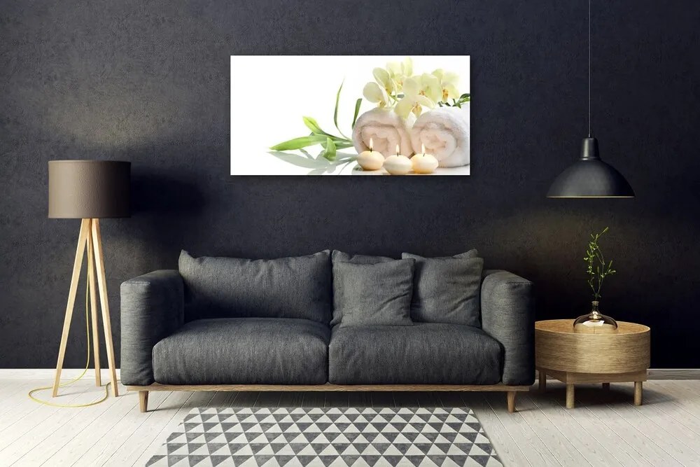 Skleneny obraz Kúpele uteráky sviece orchidea 125x50 cm