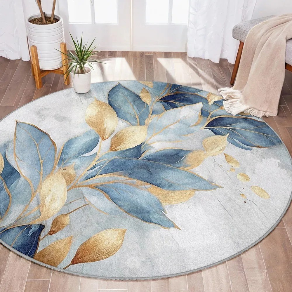 Prateľný okrúhly koberec v modrej a zlatej farbe ø 100 cm Golden Leaves – Mila Home