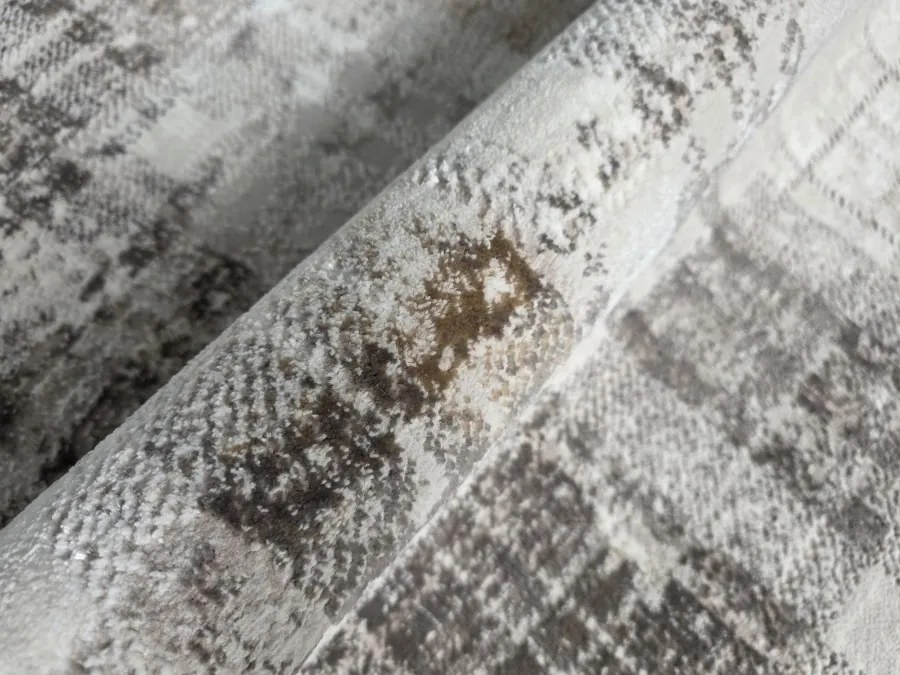 DC Koberec Oman 415 tmavá vizion zlatá Rozmer: 60×100 cm