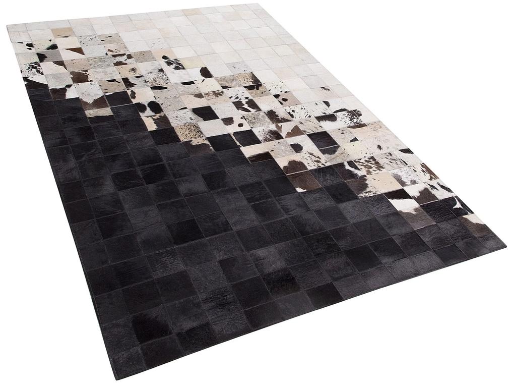 Kožený koberec 160 x 230 cm čierna/biela KEMAH Beliani