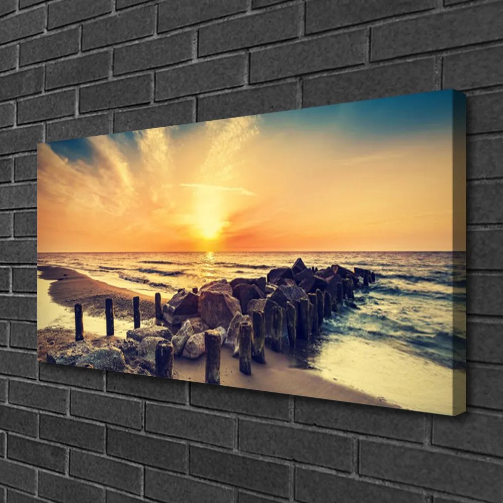 Obraz Canvas Pláž vlnolam more západ 140x70 cm