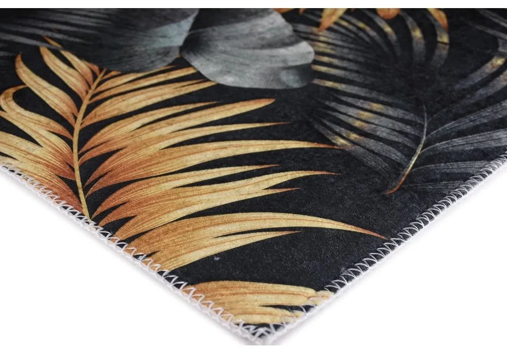 Prateľný koberec v tmavomodrej a zlatej farbe 80x150 cm Midnight Leaves – Vitaus