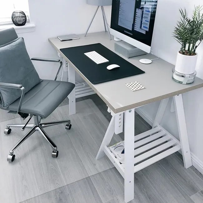 Podložka pod stoličku 100x140 cm priesvitná