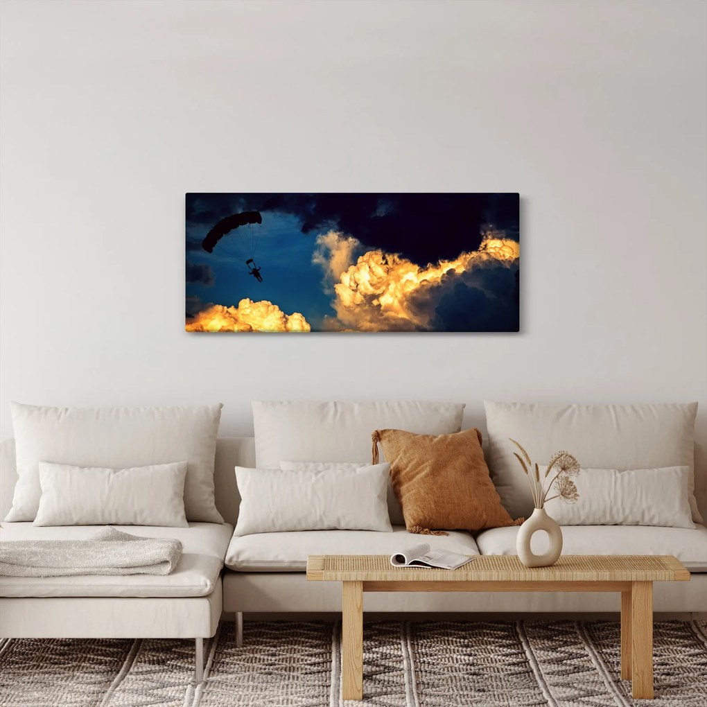 Obraz parašutistu v oblakoch (120x50 cm)