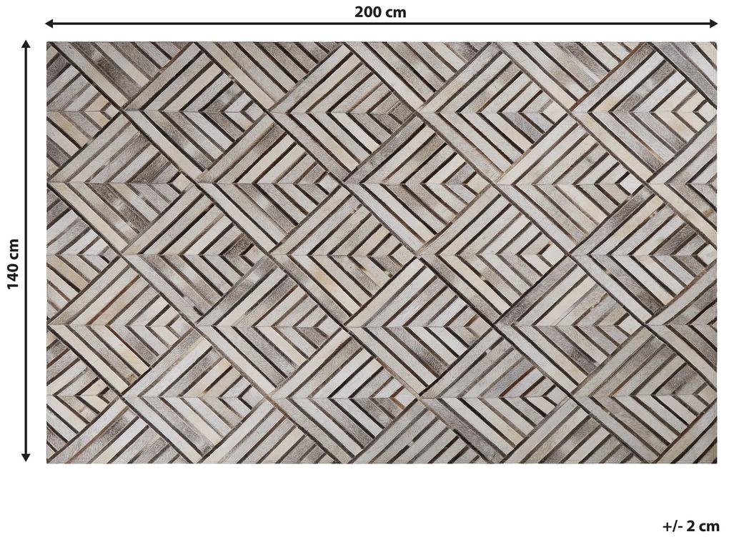 Kožený koberec 140 x 200 cm béžový TEKIR Beliani