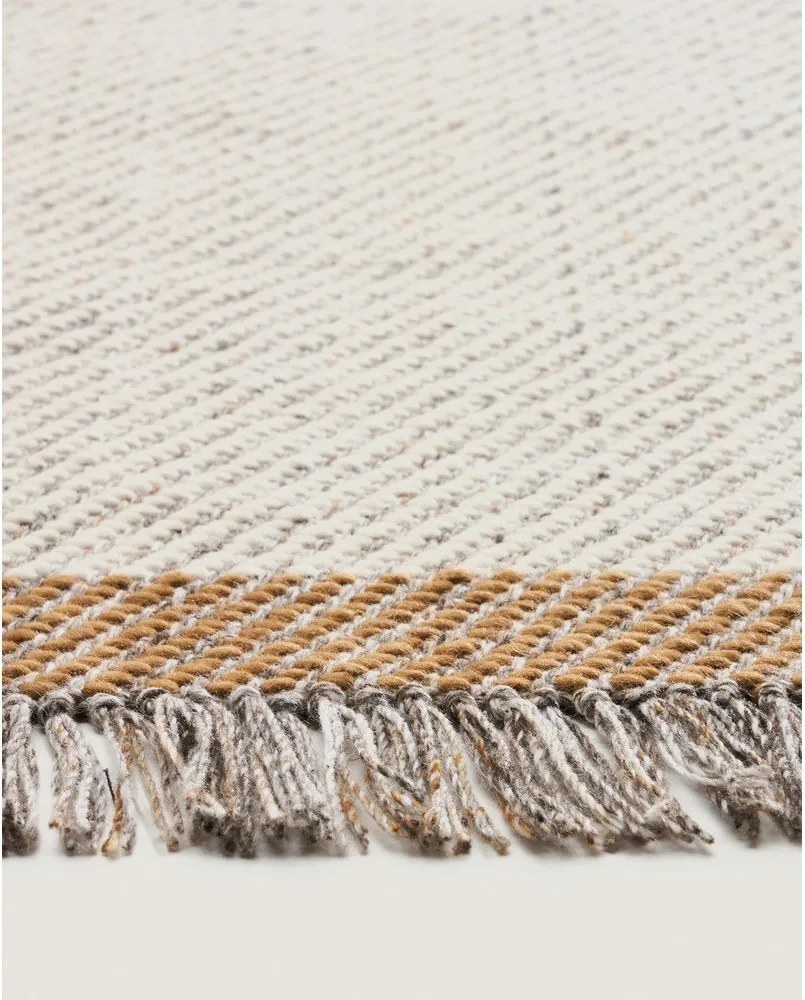 Krémovobiely ručne tkaný vlnený koberec 200x300 cm Brina – Kave Home