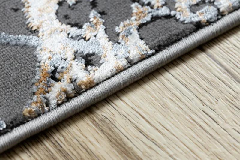 Moderný koberec DE LUXE 622 Abstrakcia - Štrukturálny sivo / zlatý