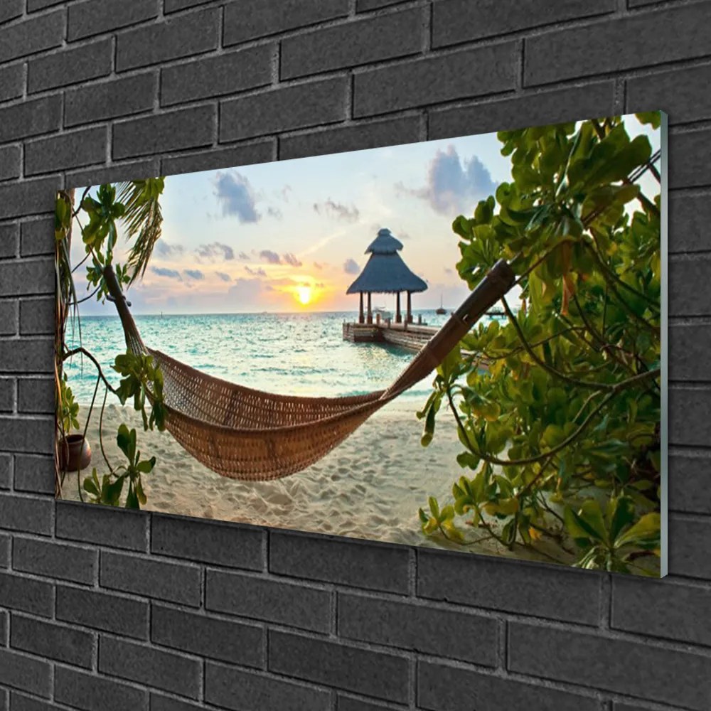 Obraz na skle Pláž hamaka more krajina 100x50 cm