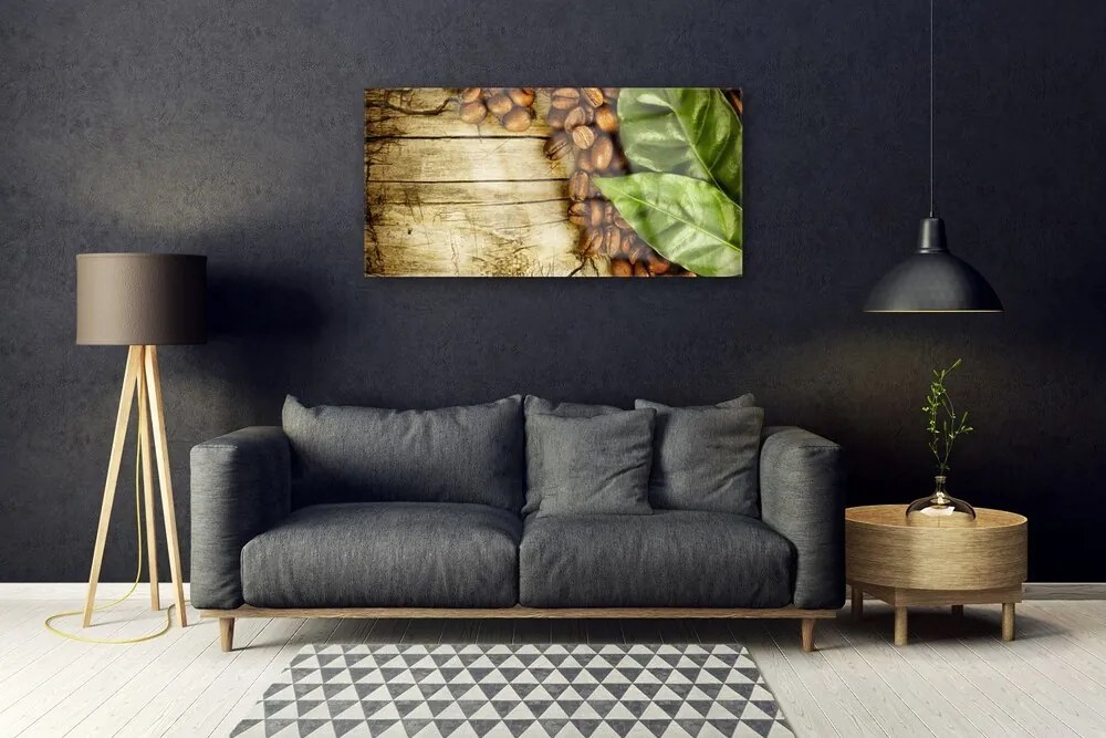 Obraz na skle Zrnká káva listy kuchyňa 100x50 cm