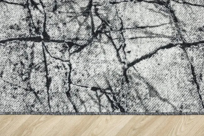 Metrážny koberec Grain 19 sivý