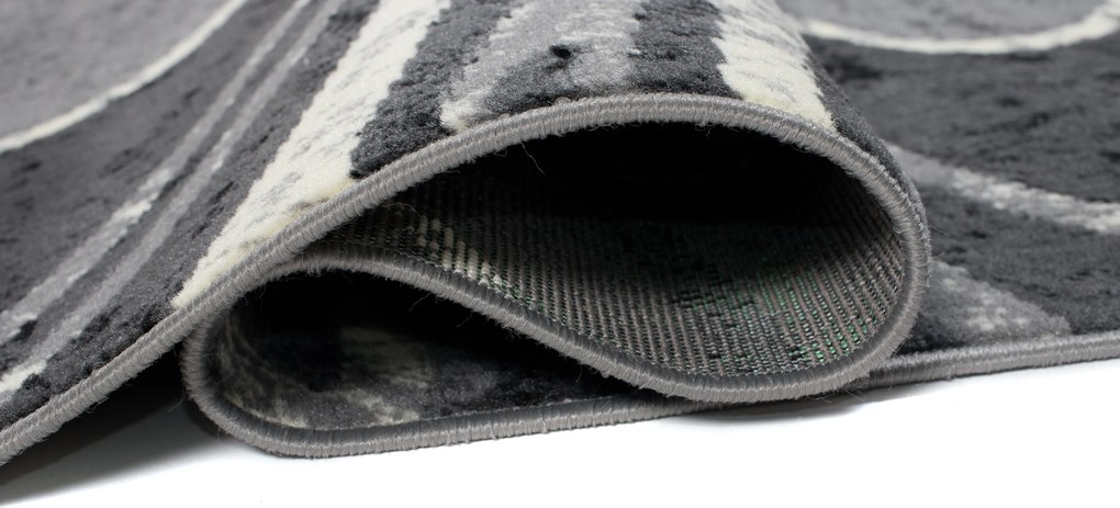 TA Koberec 2640A TMAVO SIVÁ LACNÁ PP CRM Rozmer: 80x200 cm