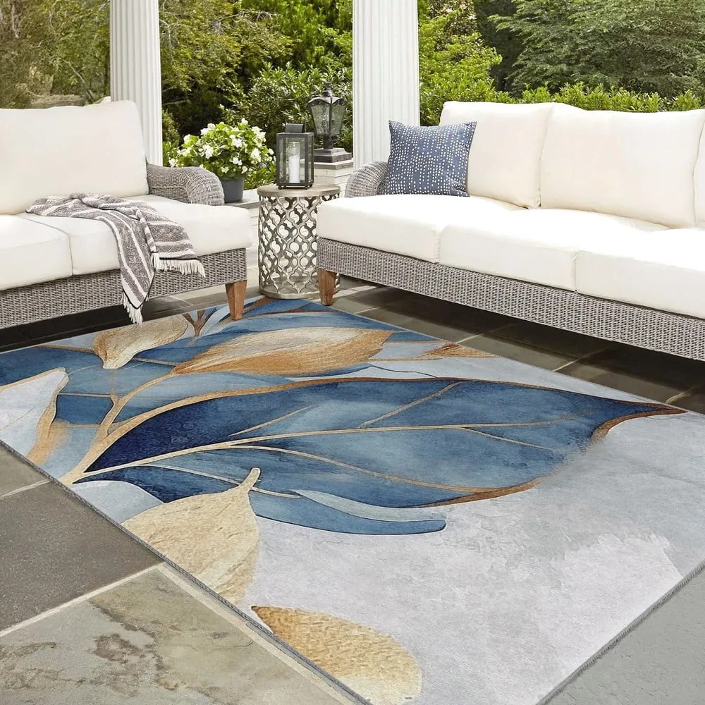 Prateľný koberec v modrej a zlatej farbe 120x180 cm Golden Leaves – Mila Home
