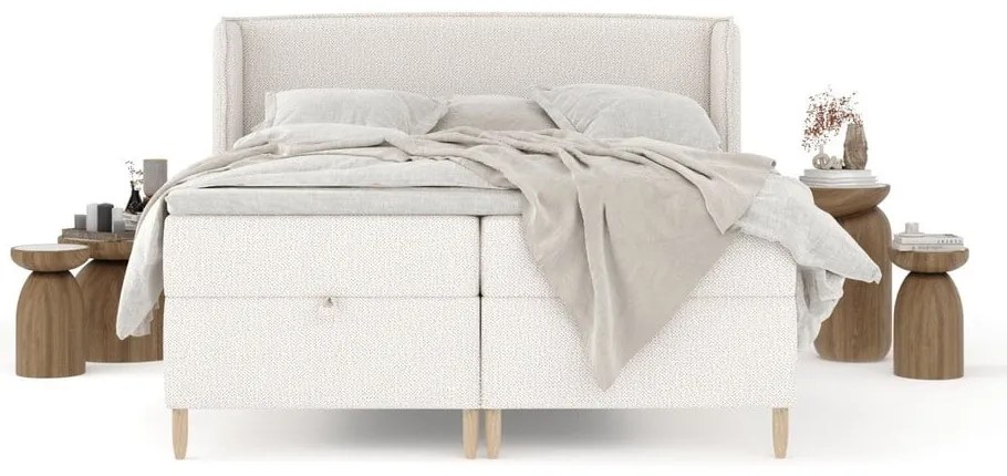 Krémová boxspring posteľ s úložným priestorom 180x200 cm Monpelli – Maison de Rêve