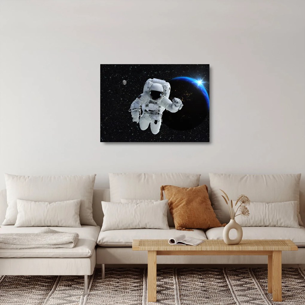 Sklenený obraz - Astronaut vo vesmíre (70x50 cm)