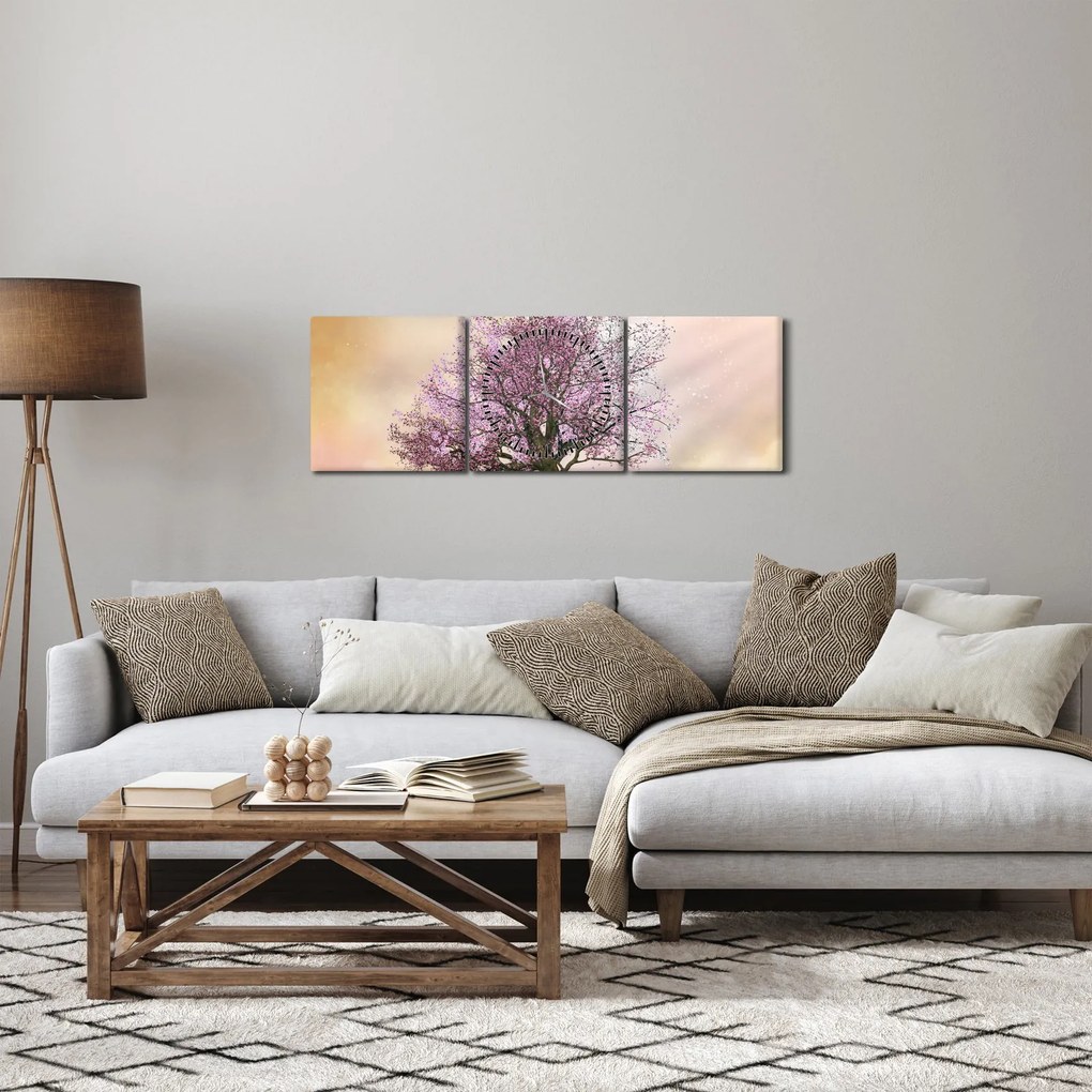 Obraz rozkvitnutého stromu na vrchole kopca (s hodinami) (90x30 cm)