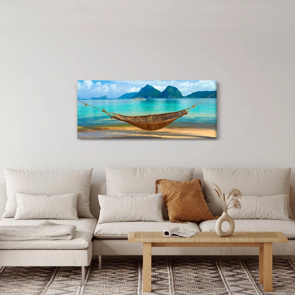 Obraz - Hojdacia sieť na pláži (120x50 cm)