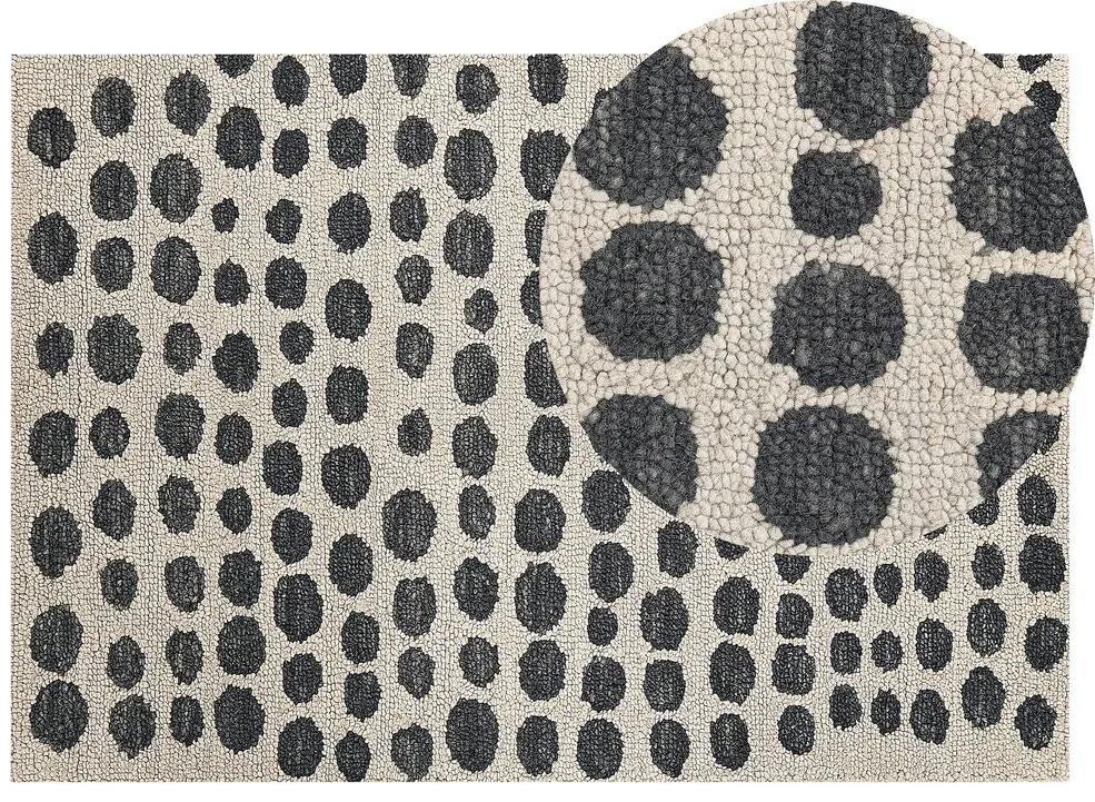 Vlnený koberec 140 x 200 cm béžová/čierna HAVRAN Beliani