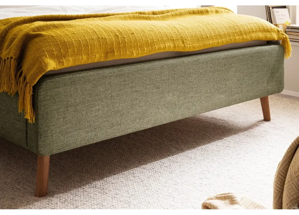 Zelená čalúnená dvojlôžková posteľ s úložným priestorom s roštom 180x200 cm Lotte - Meise Möbel