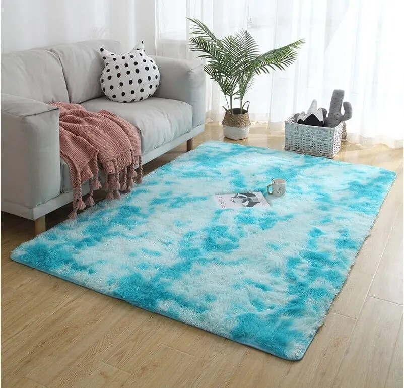 Modrý shaggy koberec s ombre prechodom – obdĺžnikový dizajn Rozmer: 120x170 cm