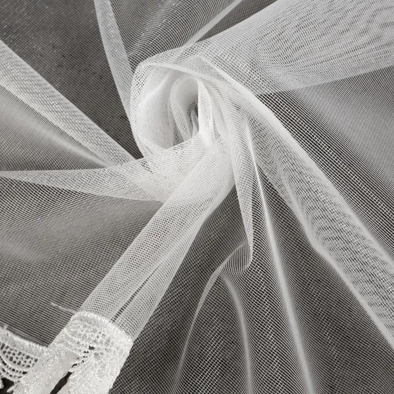 Biela záclona na páske MAYA s ozdobnou čipkou 300x145 cm