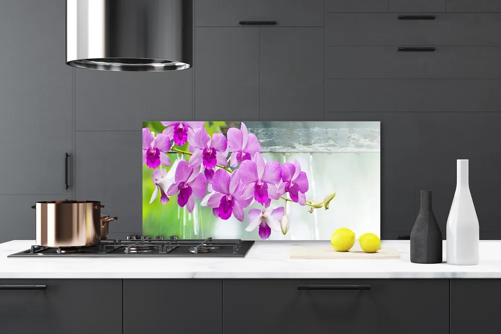 Sklenený obklad Do kuchyne Orchidey kvapky príroda 140x70 cm