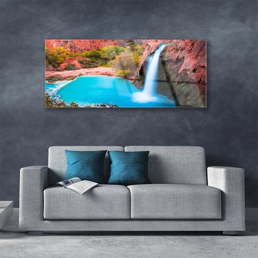 Obraz na akrylátovom skle Vodopád hory príroda 125x50 cm