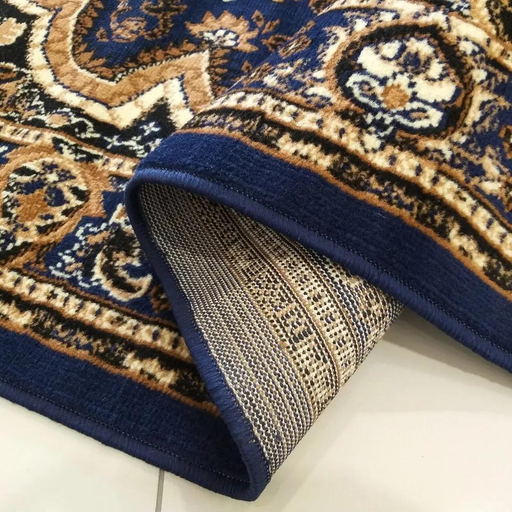 Vintage koberec v modrej farbe