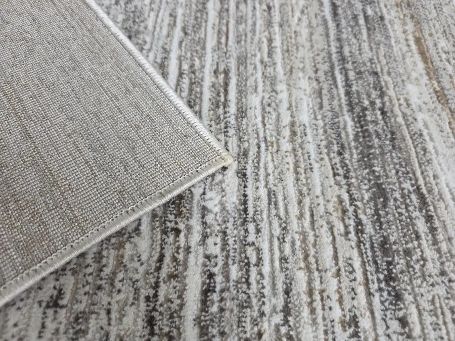 DC Koberec Oman 412 tmavá vizion zlatá Rozmer: 240×330 cm