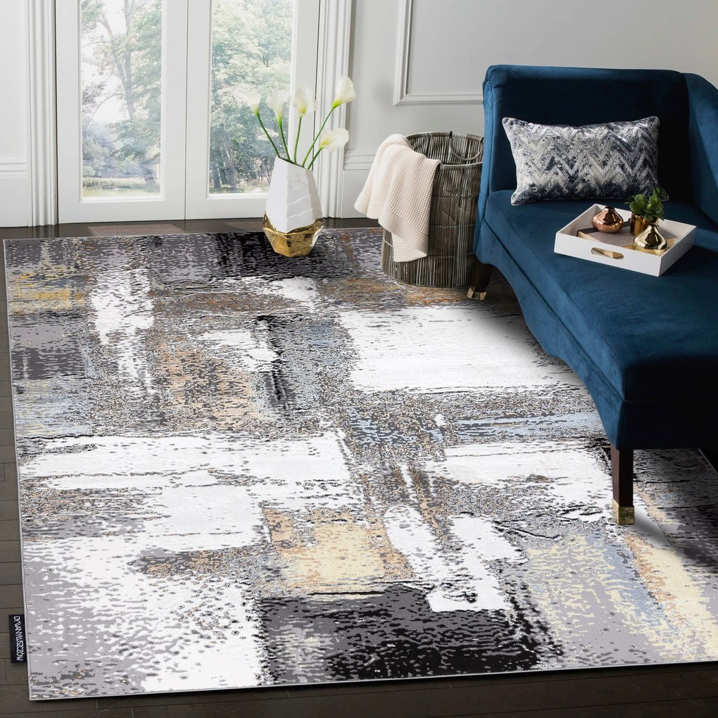 Moderný koberec DE LUXE 633 Abstrakcia - Štrukturálny krém / zlatý