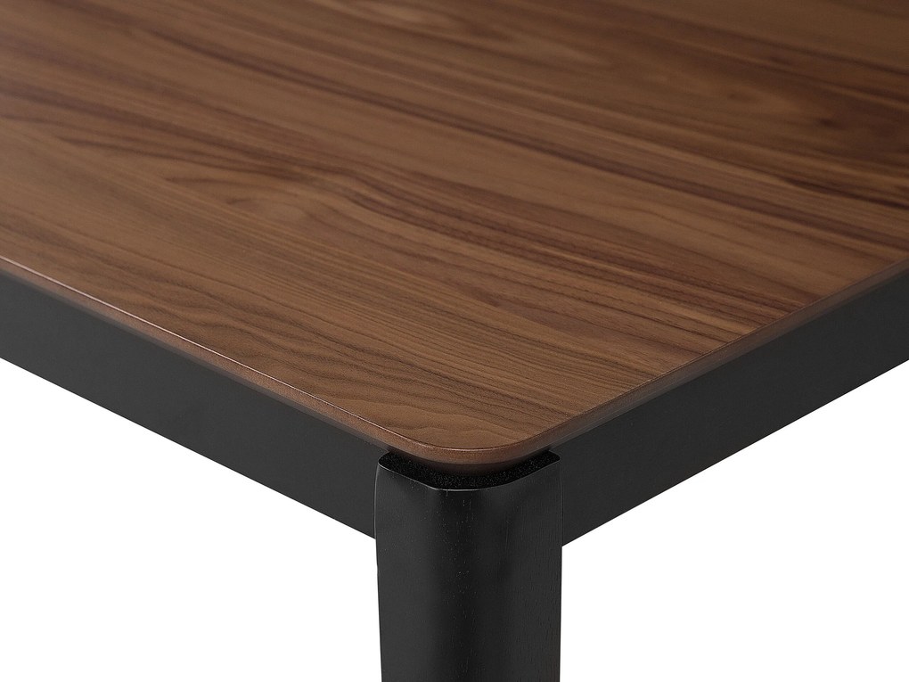 Jedálenský stôl 135 x 80 cm tmavé drevo/čierna CEDAR Beliani